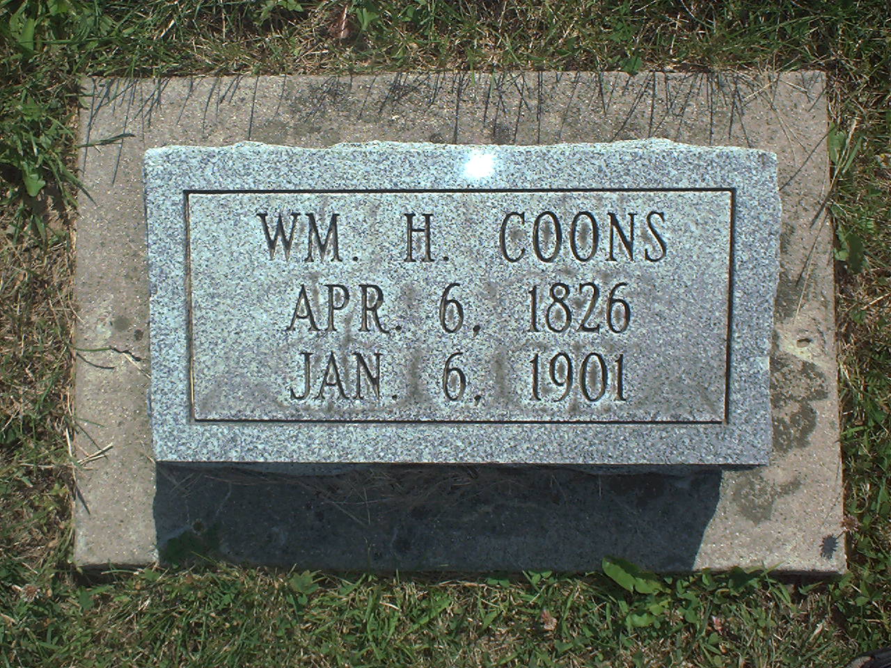 Wm H. Coons headstone